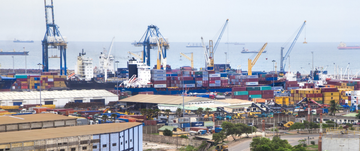 An overview image of a port full of cranes and containers.